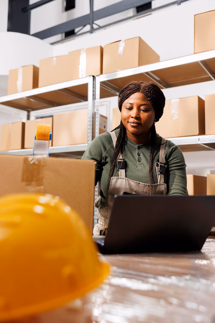 african american supervisor using cardboard boxes 482257 77620